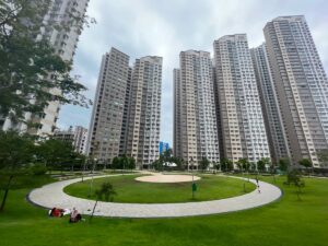 Green space encircled by HDB blocks comprising the SkyPeak @ Bukit Batok development