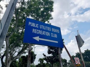 Public Utitilies Board Recreation Club sign at western end of Woodleigh Park street