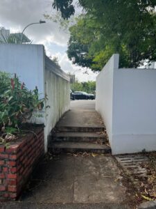 Footpath with steps connecting dead end on Jalan Pacheli to Golden Drive.