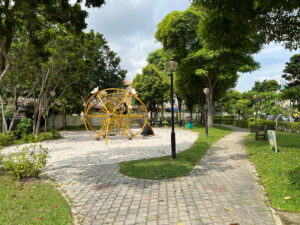 Taking a quick break in the playground on Jalan Sinar Bintang